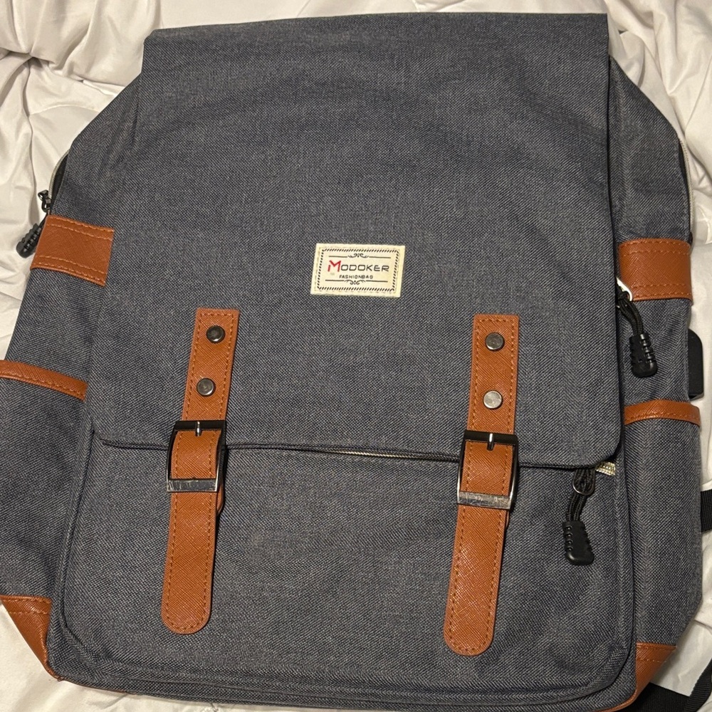 Grey Canvas Backpack with Brown Trim